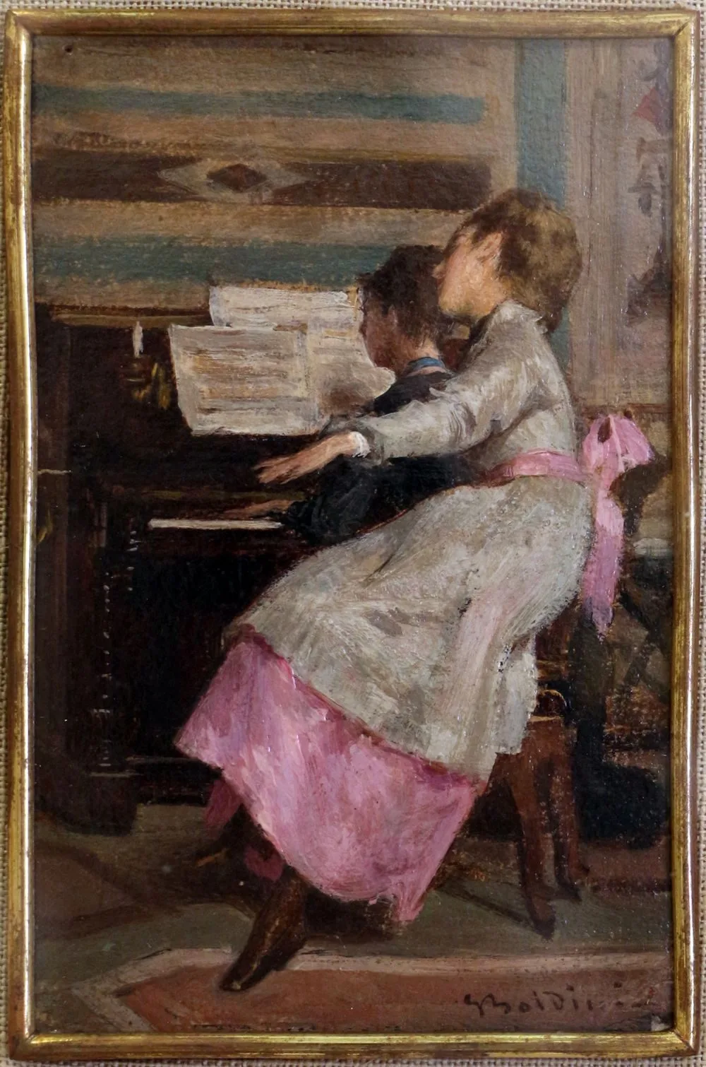 At the piano